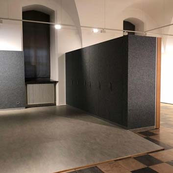Museum cloakroom, acoustically covered with felt.