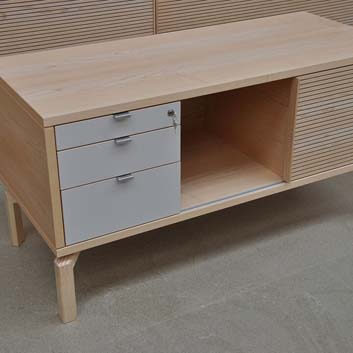 Office sideboard with sliding doors and lockable drawers.